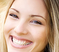 woman_smile_teeth / photo from http://geniusbeauty.com